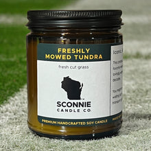 Load image into Gallery viewer, Freshly mowed tundra candle inspired by the Green Bay packers 